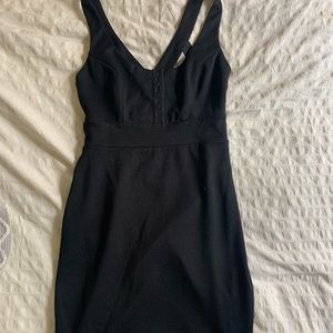 Black mini dress, caged detail on the back